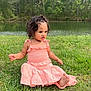 toddler, child, grass, lake, nature, outdoor, greenery, dress, curly_hair, sitting, summer, water, trees, young_child, casual, daytime, person, cute, portrait, innocence