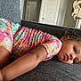 Zaylee joined the competition — help win amazing prizes! child, pajamas, floral_pattern, couch, gray_fabric, indoors, relaxed, lying_down, curly_hair, decor, crab_decoration, home_interior, door, furniture, person, casual_clothing, skin, face, expression, living_room