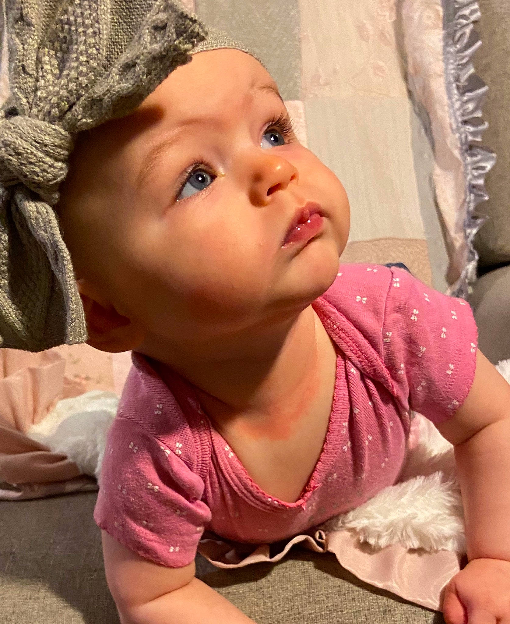 Kylah is registered to the contest to win money with this photo: baby, cheek, child, eye, face, head, headgear, headwear, lip, nose, person, pink, skin, smile, toddler