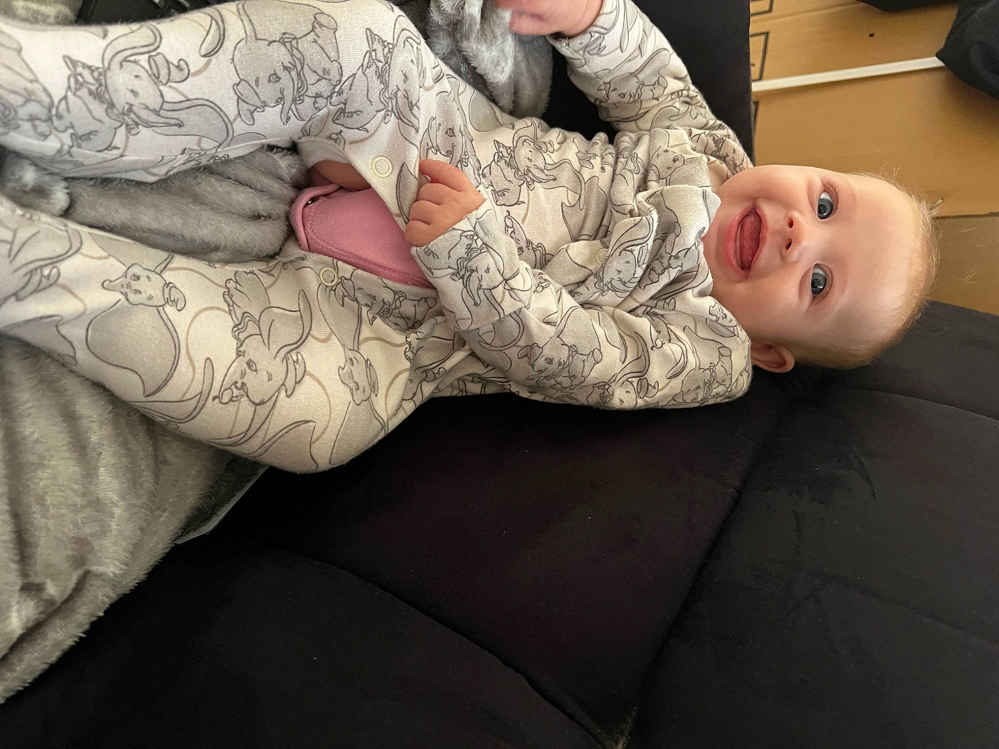 Eliza joined the competition — help win amazing prizes! arm, comfort, couch, elbow, finger, gesture, hand, human_body, human_leg, joint, knee, leg, pattern, person, sleeve, smile, tattoo, thigh, toddler, tree