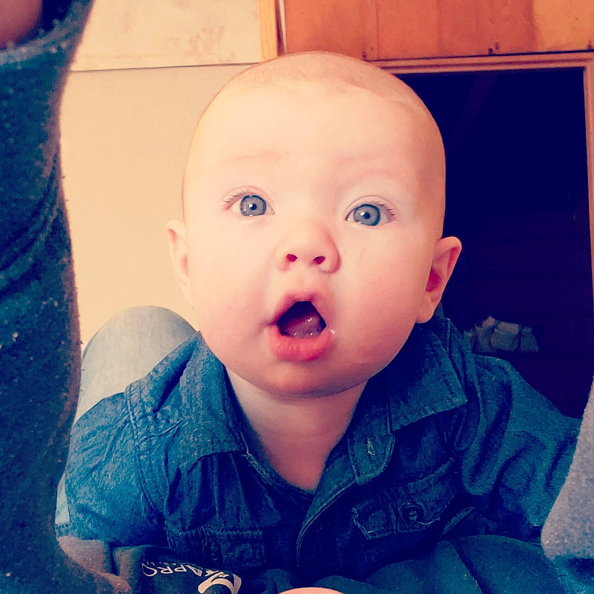 Brennan is registered to the contest to win money with this photo: baby, beauty, cheek, child, chin, cool, eye, eyebrow, face, facial_expression, forehead, head, iris, lip, nose, organ, person, skin, sky, smile