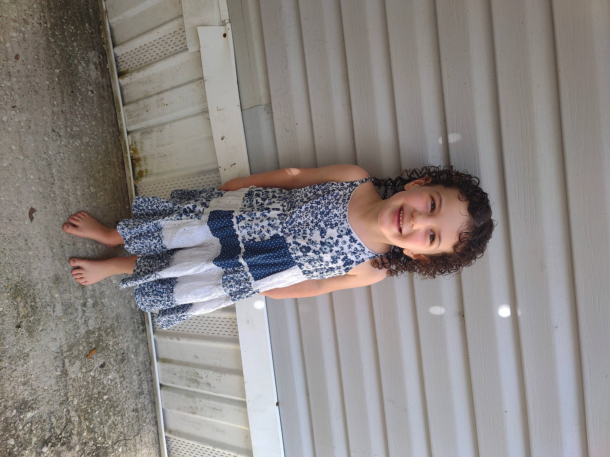 Ruby is registered to the contest to win money with this photo: baby_toddler_clothing, child, composite_material, fun, happy, human_leg, joy, pattern, person, sleeve, smile, street_fashion, thigh, toddler, waist, wood