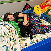 Roro joined the competition — help win amazing prizes! person, child, cat, tuxedo_cat, black_cat, bed, bedding, pillow, emoji_pillow, stuffed_toy, minecraft_pattern, blanket, pajamas, cozy, indoor, pet, playful, sleeping, colorful, hand_pet