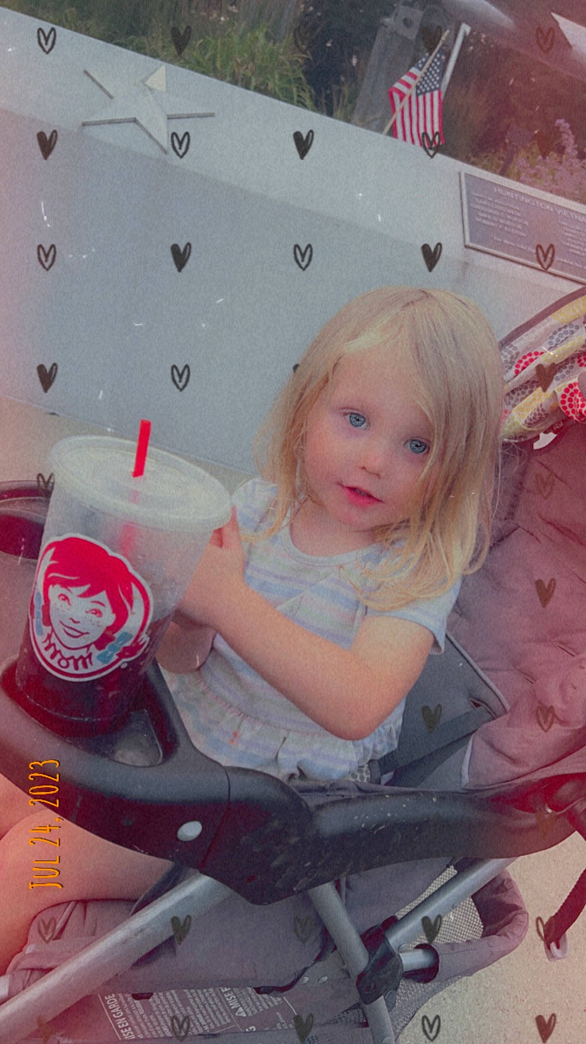 Zavayah is registered to the contest to win money with this photo: baby_toddler_clothing, blond, carmine, child, cool, drinkware, fun, hairstyle, happy, human_leg, leisure, lip, magenta, person, pink, product, sitting, skin, toddler, white