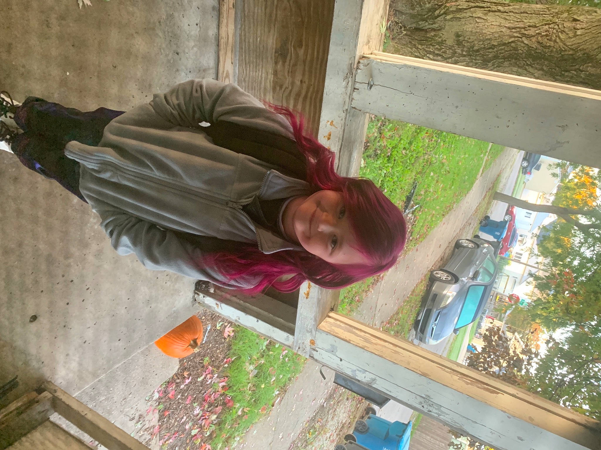 Aaliyah is registered to the contest to win money with this photo: composite_material, fun, hat, joy, leisure, person, plant, smile, tints_and_shades, tree, window, wood