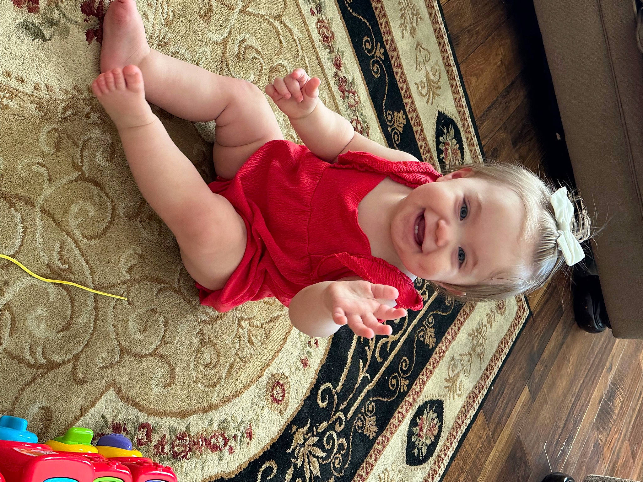 Vienna joined the competition — help win amazing prizes! baby, child, flash_photography, floor, flooring, fun, happy, human_leg, joint, joy, magenta, pattern, person, pink, red, sitting, skin, smile, textile, thigh