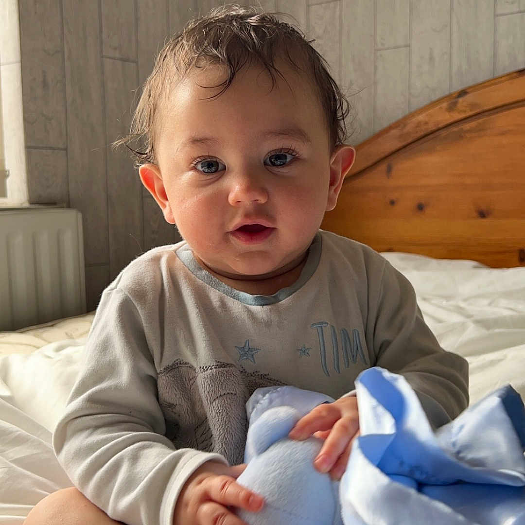 Jackson joined the competition — help win amazing prizes! architecture, baby, bed, bedroom, blanket, bodypart, building, clothing, couch, crib, cushion, face, finger, furniture, hand, happy, head, homedecor, hospital, indoors