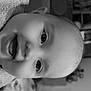 baby, infant, face, close_up, black_and_white, towel, happy, smiling, mouth_open, eyes, skin, head, child, indoor, portrait, cute, person, expression, young, babyface