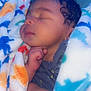 baby, sleeping, blanket, soft, colorful, cozy, child, cute, face, hand, curly_hair, infant, portrait, peaceful, indoors, warm, resting, newborn, snuggled, toddler