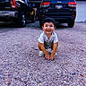 Zayden joined the competition — help win amazing prizes! toddler, child, smiling, outdoor, gravel, driveway, car, jeep, black_vehicle, squat, happy, person, casual_clothing, short_hair, daylight, garage, asphalt, vehicle, playful, portrait