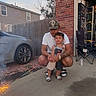 Zayden joined the competition — help win amazing prizes! child, man, sparkler, fireworks, outdoor, concrete, brick_wall, car, fence, folding_chair, clothing, shoes, summer, celebration, family, daytime, person, smile, holding, yard
