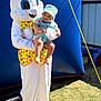 David is registered to the contest to win money with this photo: baby, bunny_costume, child, colorful_clothing, costume, daylight, easter_bunny, face, festival, grass, hat, inflatable, outdoor, person, playful, plush, smile, sunlight, toy, yellow_bow_tie