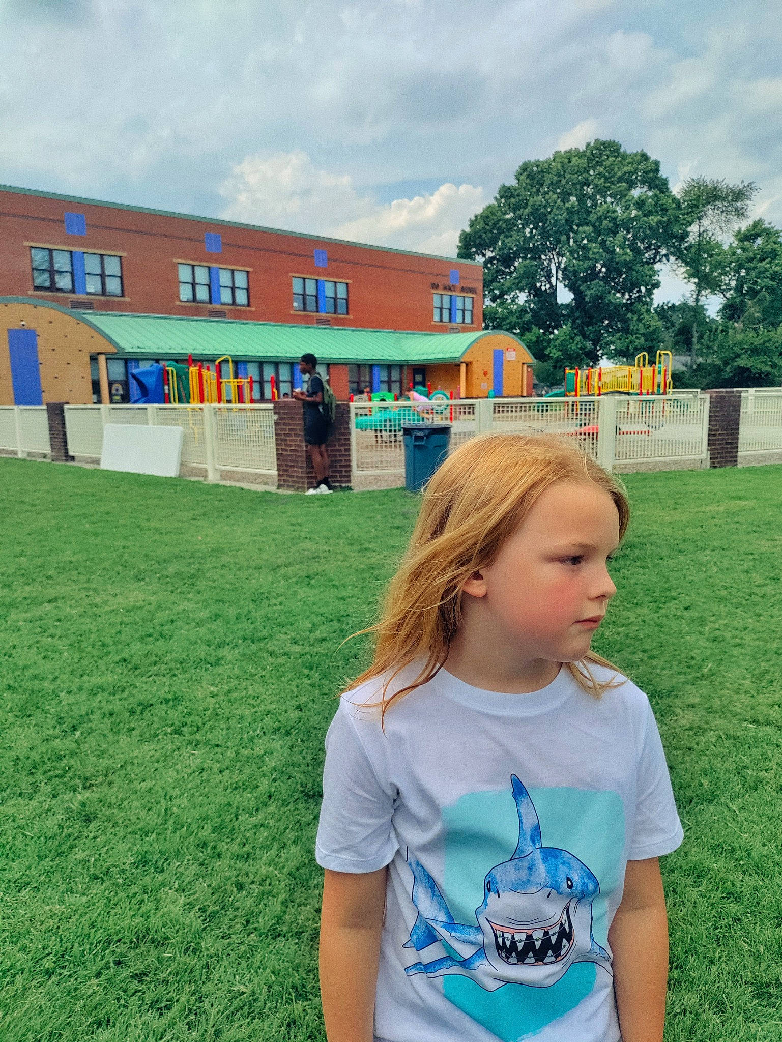 Leelynn is registered to the contest to win money with this photo: city, cloud, electric_blue, fun, grass, grass_family, grassland, happy, landscape, leisure, meadow, person, plant, play, prairie, public_space, recreation, sky, summer, t_shirt