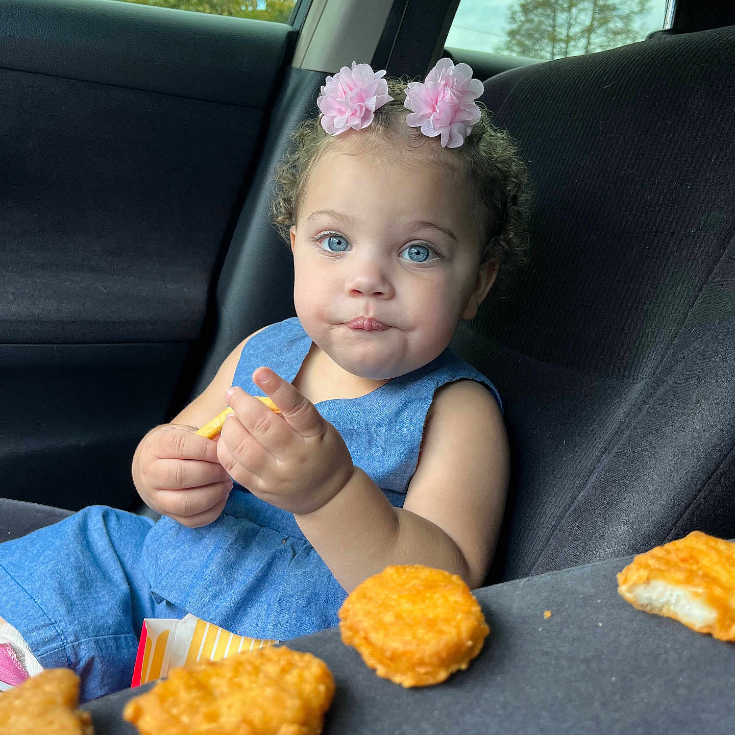 Amirah joined the competition — help win amazing prizes! baby, bodypart, bread, eating, face, finger, food, friedchicken, fritters, hand, head, lunch, meal, nuggets, person, photography, portrait, sitting, snack, tatertots