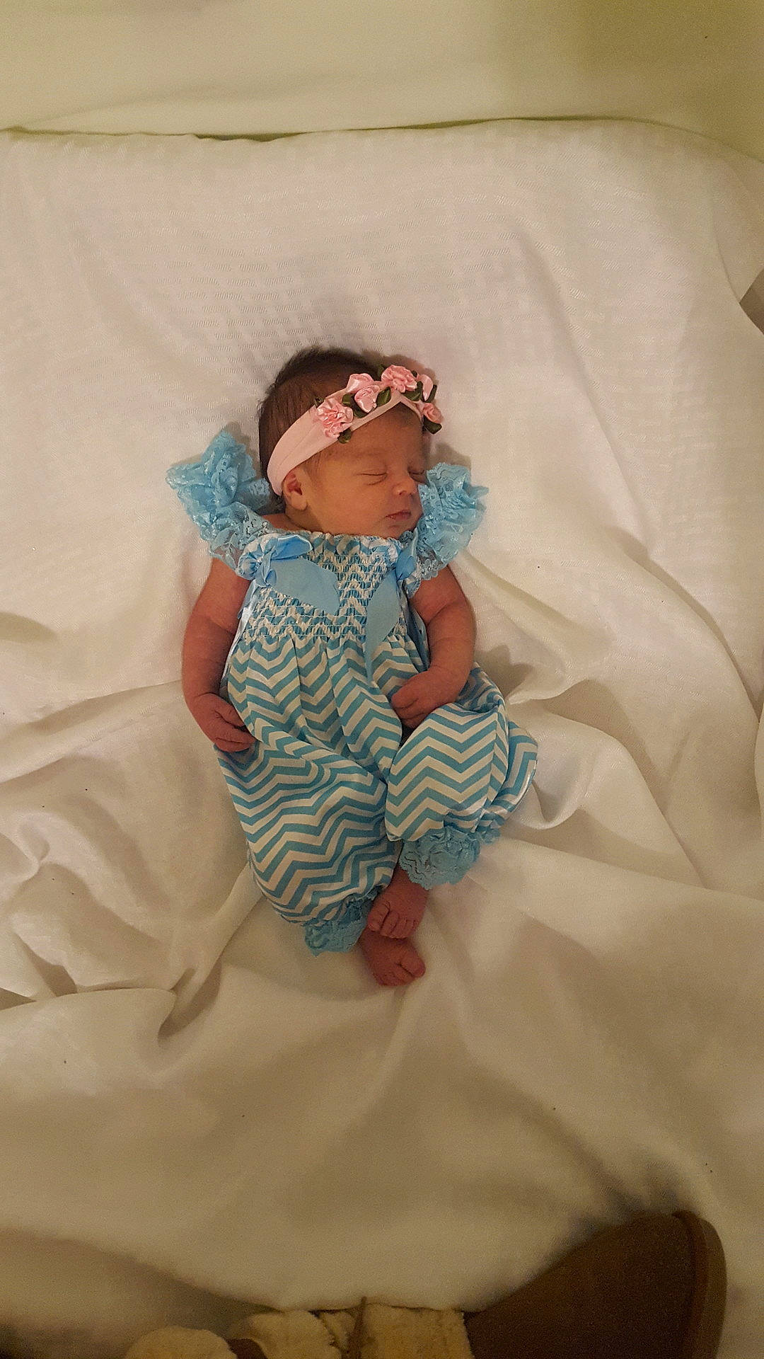 Emersyn is registered to the contest to win money with this photo: bed, bedtime, blue, child, girl, hair_accessory, headgear, headwear, infant, material, person, product, sleep, textile, toddler