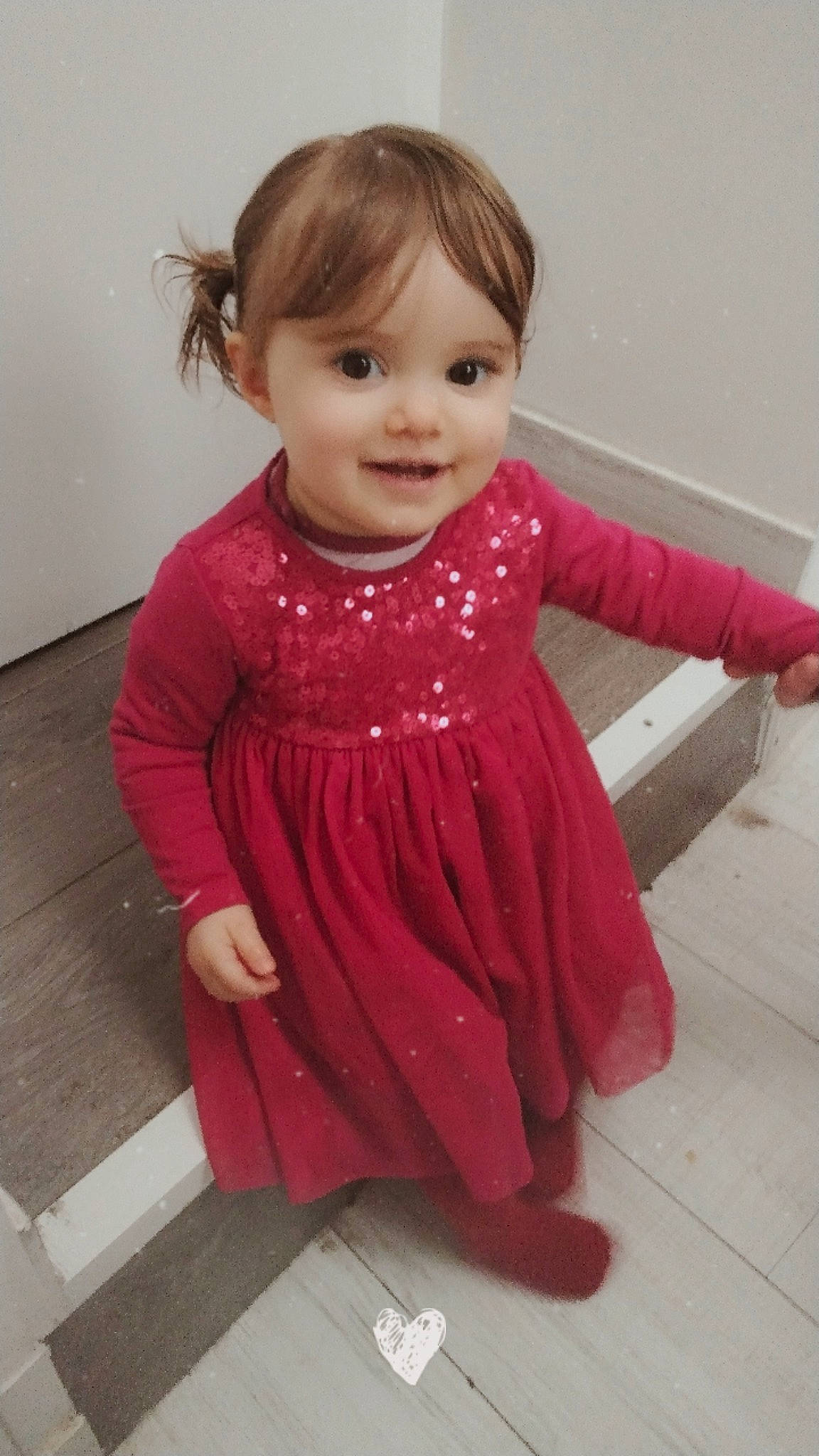 Inaya participe au concours pour gagner de l'argent avec cette photo : baby, baby_toddler_clothing, cheek, day_dress, dress, eyelash, gesture, happy, iris, joint, joy, magenta, neck, one_piece_garment, person, pink, shoulder, skin, sleeve, smile