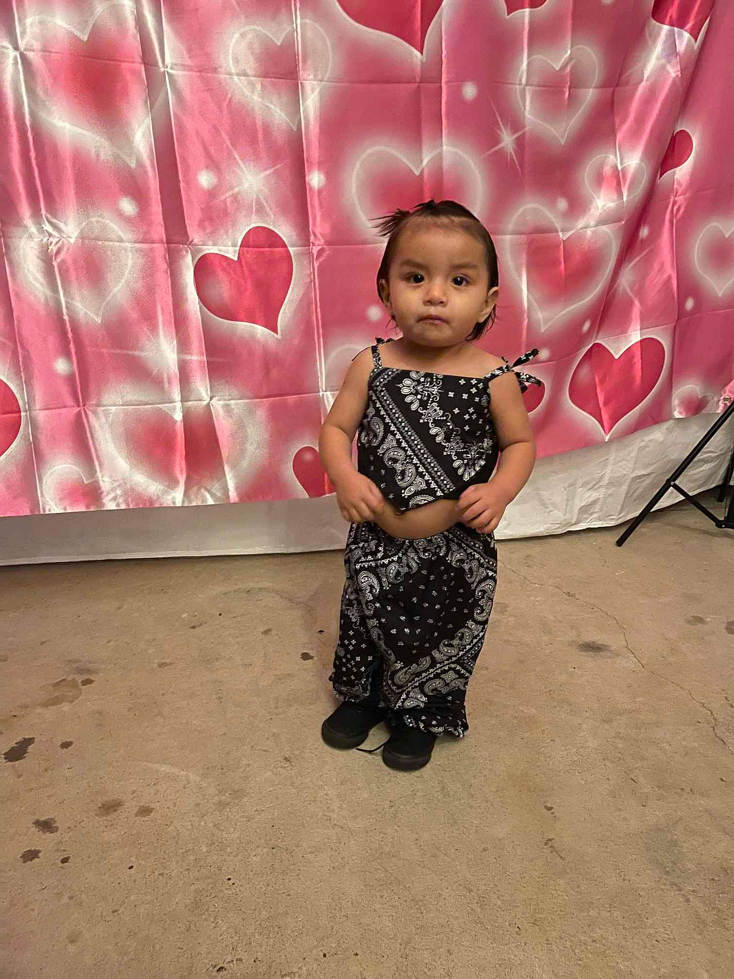 Estella is registered to the contest to win money with this photo: baby_toddler_clothing, child, day_dress, event, fashion_design, flash_photography, floor, flooring, fun, happy, human_leg, magenta, one_piece_garment, pattern, person, pink, sandal, sleeve, tints_and_shades, toddler