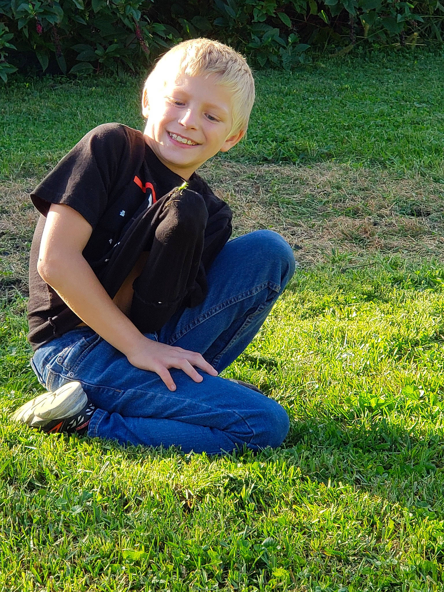 Johnathan joined the competition — help win amazing prizes! garden, grass, grass_family, grassland, green, happy, joy, lawn, leaf, leisure, male, meadow, people_in_nature, person, photography, plant, sitting, smile, spring, yard