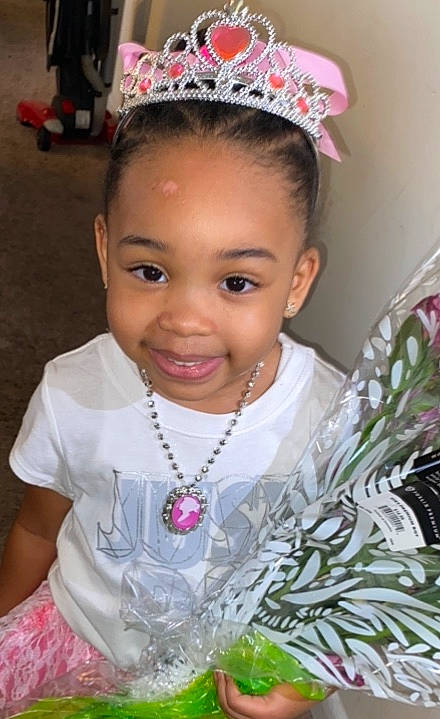 Cadence is registered to the contest to win money with this photo: baby, child, fashion_accessory, forehead, hair, hair_accessory, head, headband, headgear, headpiece, joy, person, pink, smile, tiara, toddler