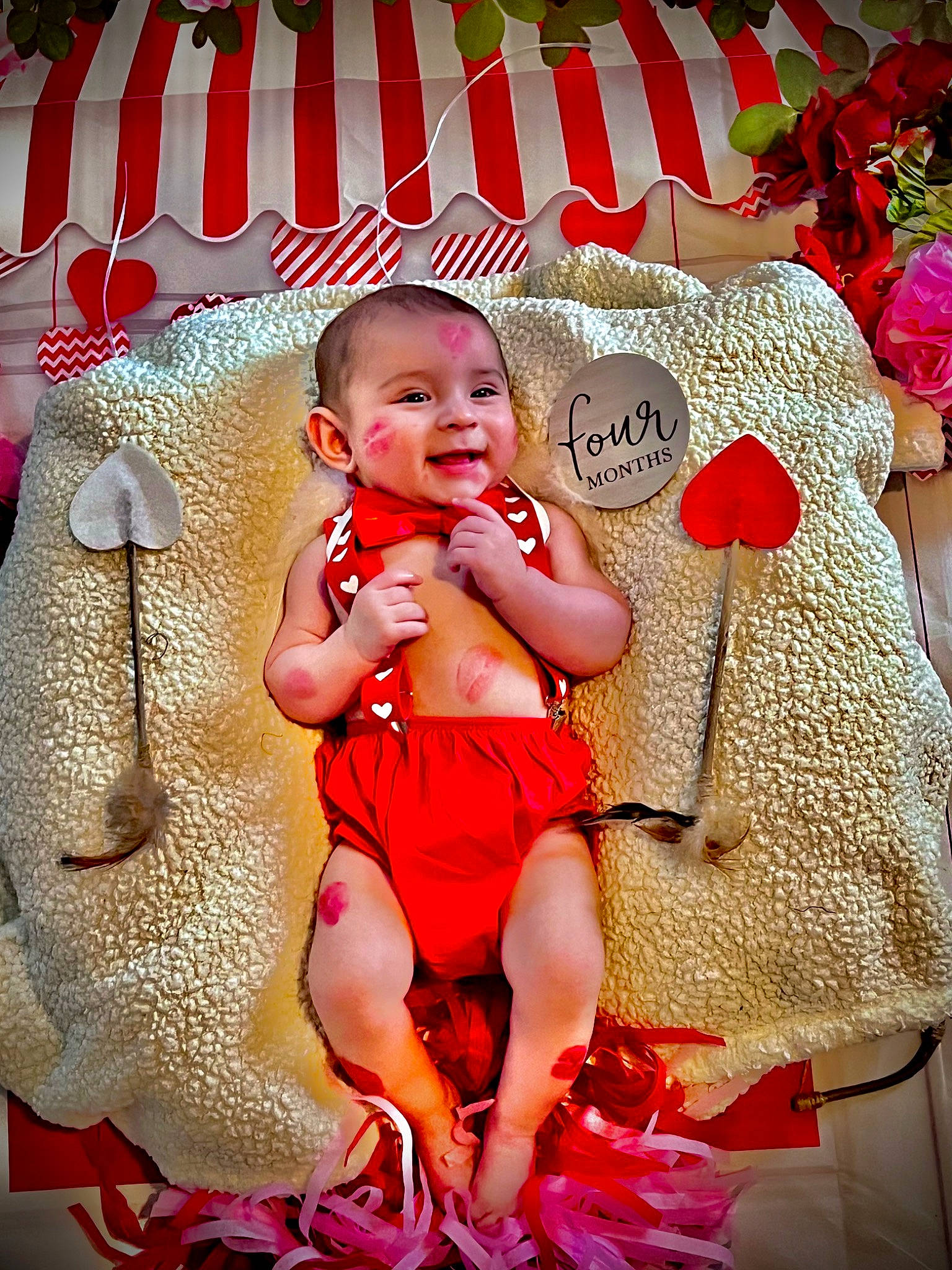 Raphael is registered to the contest to win money with this photo: baby, baby_toddler_clothing, child, christmas, christmas_eve, event, fashion_accessory, fun, happy, holiday, magenta, peach, person, pink, product, red, sitting, skin, smile, toddler