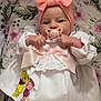 Dolce-Mai is registered to the contest to win money with this photo: baby, infant, pacifier, headband, pink_bow, white_dress, winnie_the_pooh, piglet, floral_blanket, cute, lying_down, clothing, child, adorable, soft_colors, pastel, portrait, indoors, baby_girl, hands