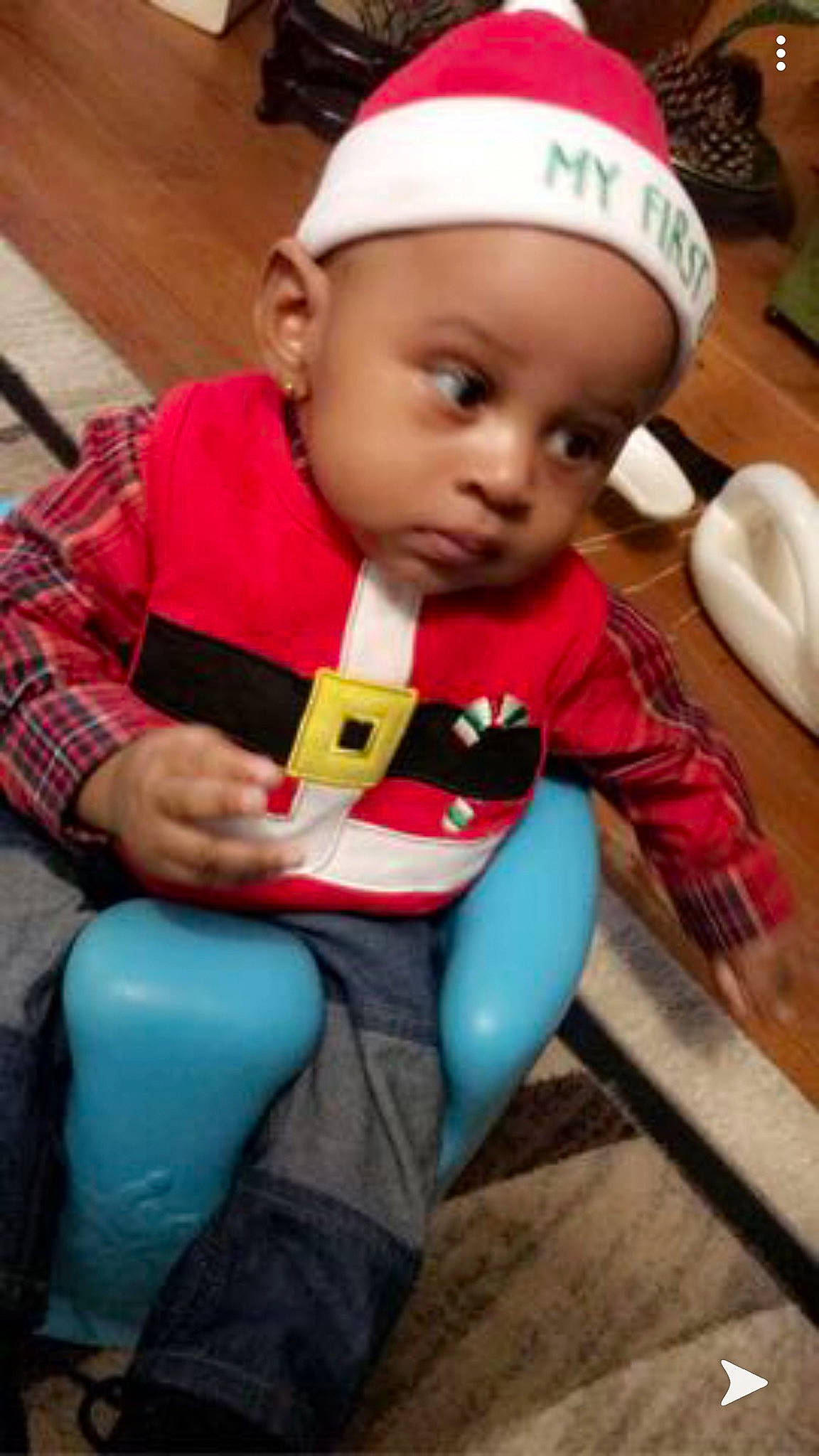 Jaylin is registered to the contest to win money with this photo: baby, baby_products, baby_toddler_clothing, bowl, ceramic, child, christmas, costume_accessory, dishware, fictional_character, kitchen_utensil, lap, overall, person, plaid, porcelain, serveware, sitting, sock, tartan