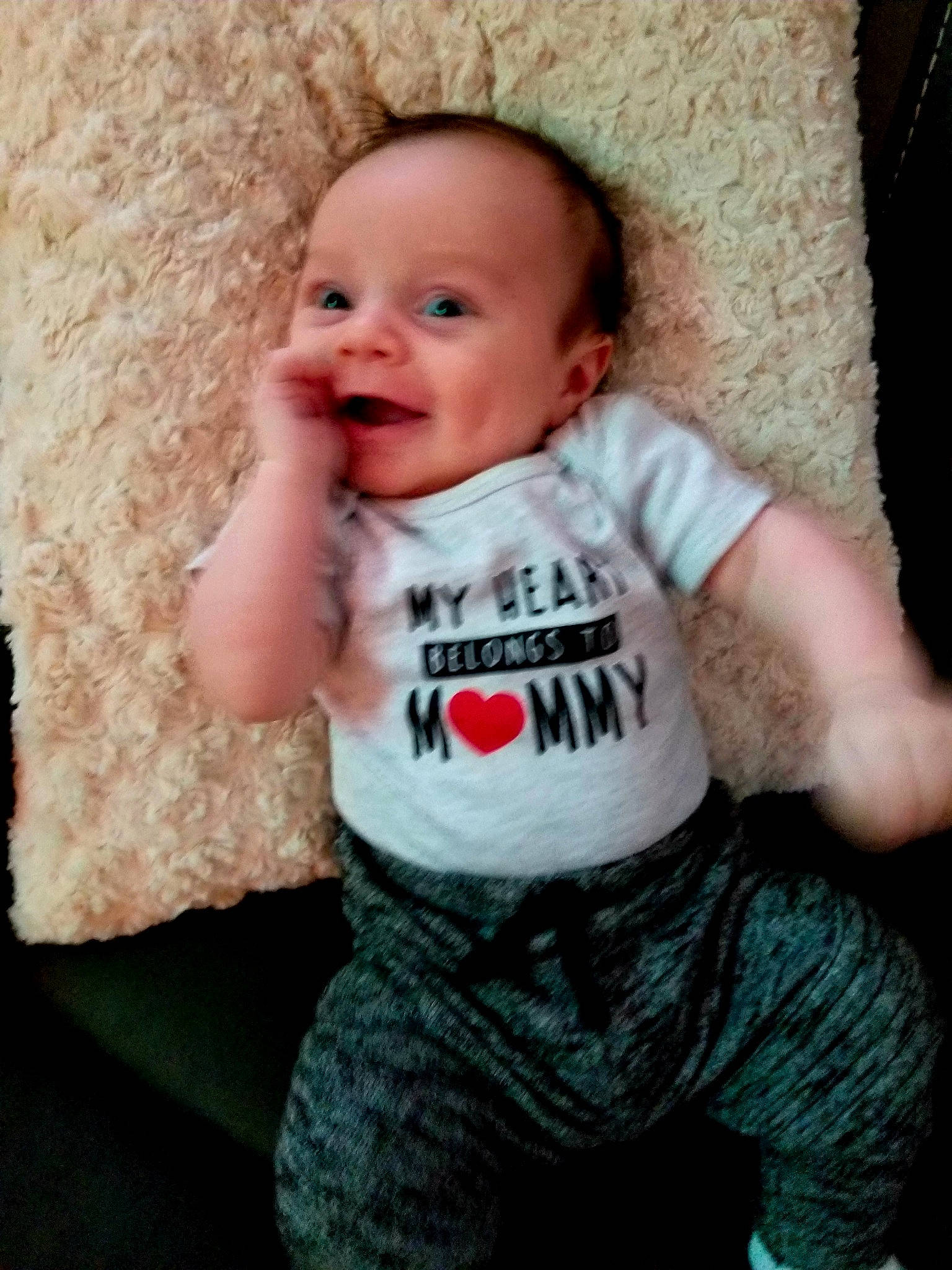 Giovani is registered to the contest to win money with this photo: baby, baby_products, baby_toddler_clothing, cheek, child, nose, person, product, sitting, skin, sleeve, smile, t_shirt, toddler