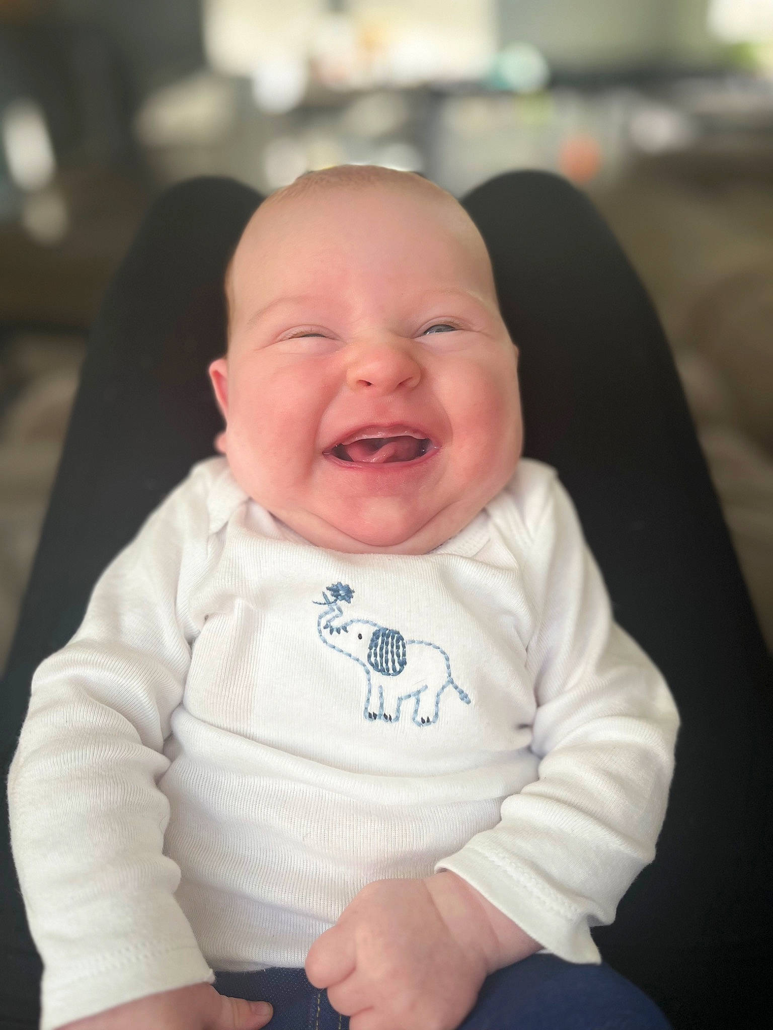 Sadie is registered to the contest to win money with this photo: baby, baby_products, baby_toddler_clothing, cheek, child, comfort, eye, eyebrow, finger, gesture, happy, iris, lip, mouth, nose, person, sitting, skin, sleeve, smile