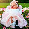 Natalia joined the competition — help win amazing prizes! baby, newborn, flower_garden, pink_tutu, mittens, headband, sleeping, outdoor, greenery, daisies, cute, peaceful, portrait, infant, soft_light, nature, grass, colorful_flowers, child, adorable