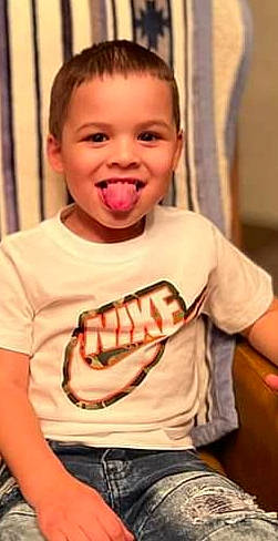 Jayden is registered to the contest to win money with this photo: arm, cheek, chin, clothing, cool, finger, gesture, happy, head, human_body, jaw, joy, mouth, muscle, neck, nose, organ, person, shoulder, sleeve