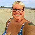 Sandy S.