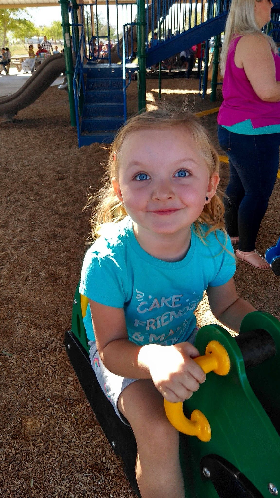 Makaylee joined the competition — help win amazing prizes! child, city, fun, human_settlement, leisure, outdoor_play_equipment, person, play, playground, public_space, recreation, smile, toddler, vacation
