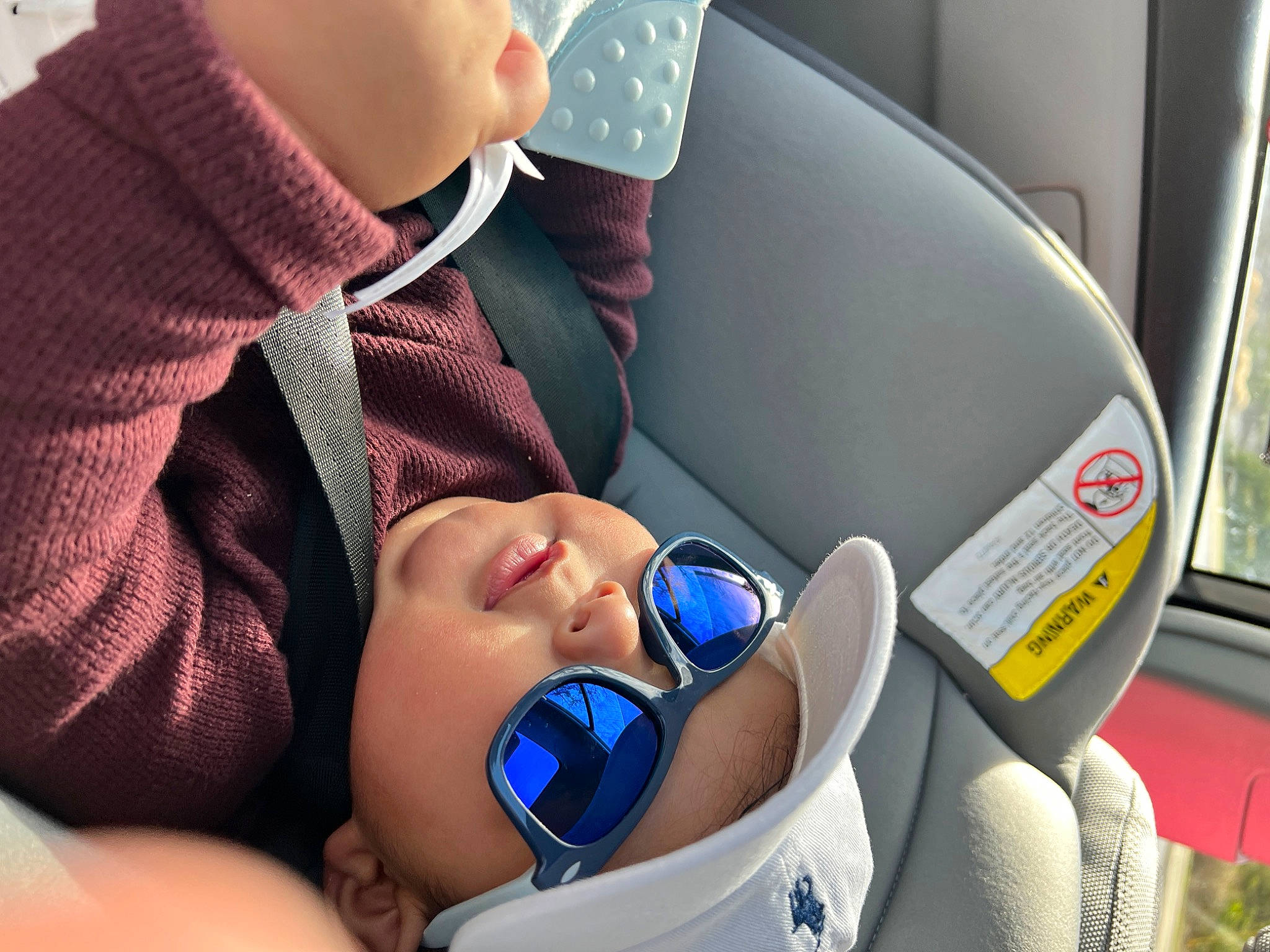 Kashton is registered to the contest to win money with this photo: auto_part, automotive_design, baby, baby_in_car_seat, baby_toddler_clothing, car_seat, car_seat_cover, child, comfort, eyewear, head_restraint, headwear, motor_vehicle, nail, person, product, service, steering_wheel, sunglasses, toddler