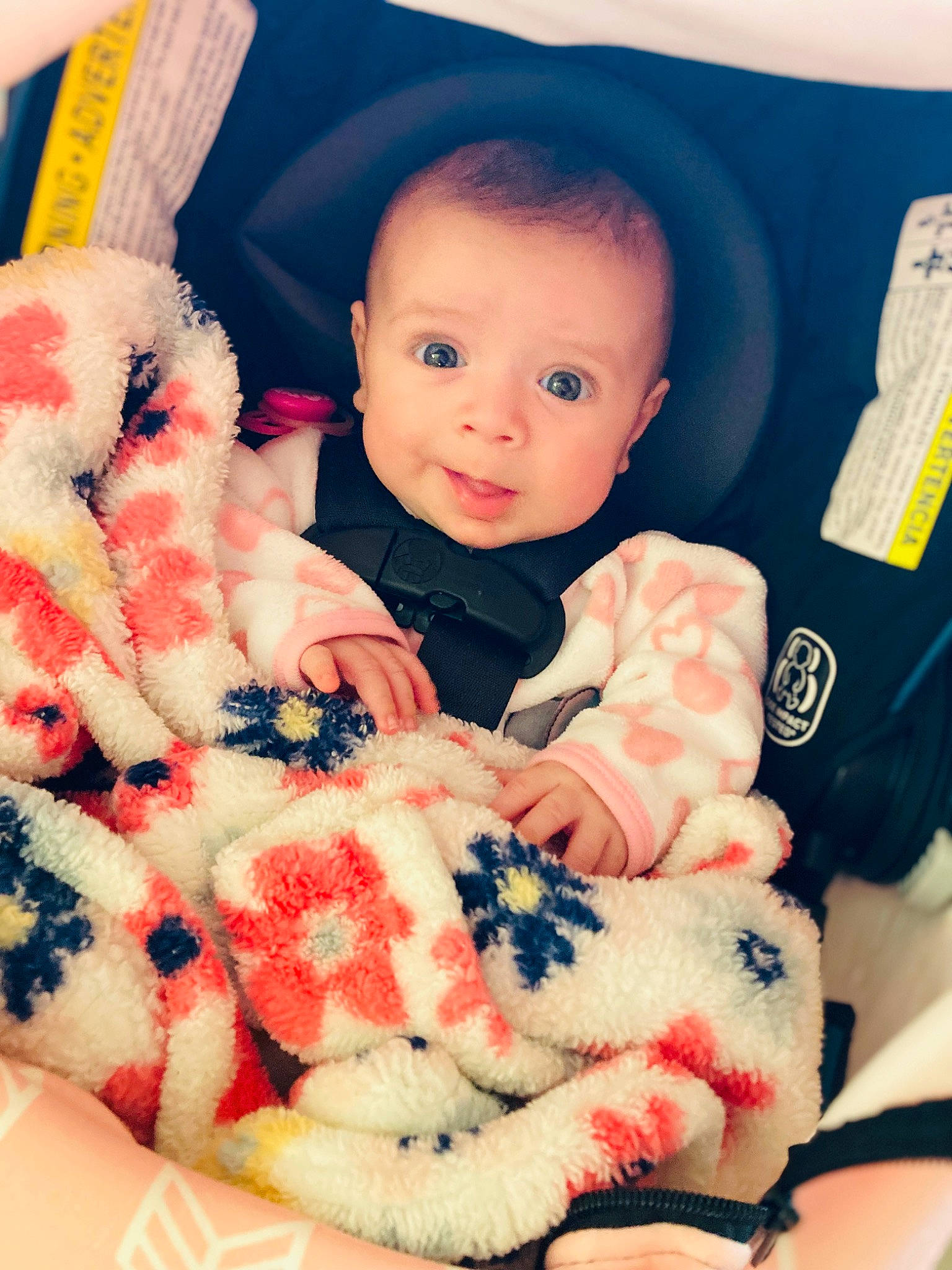 Paisley Ray is registered to the contest to win money with this photo: baby, baby_toddler_clothing, child, comfort, finger, hand, happy, linens, nail, outerwear, person, pink, red, skin, sleeve, smile, stuffed_toy, textile, toddler, toy