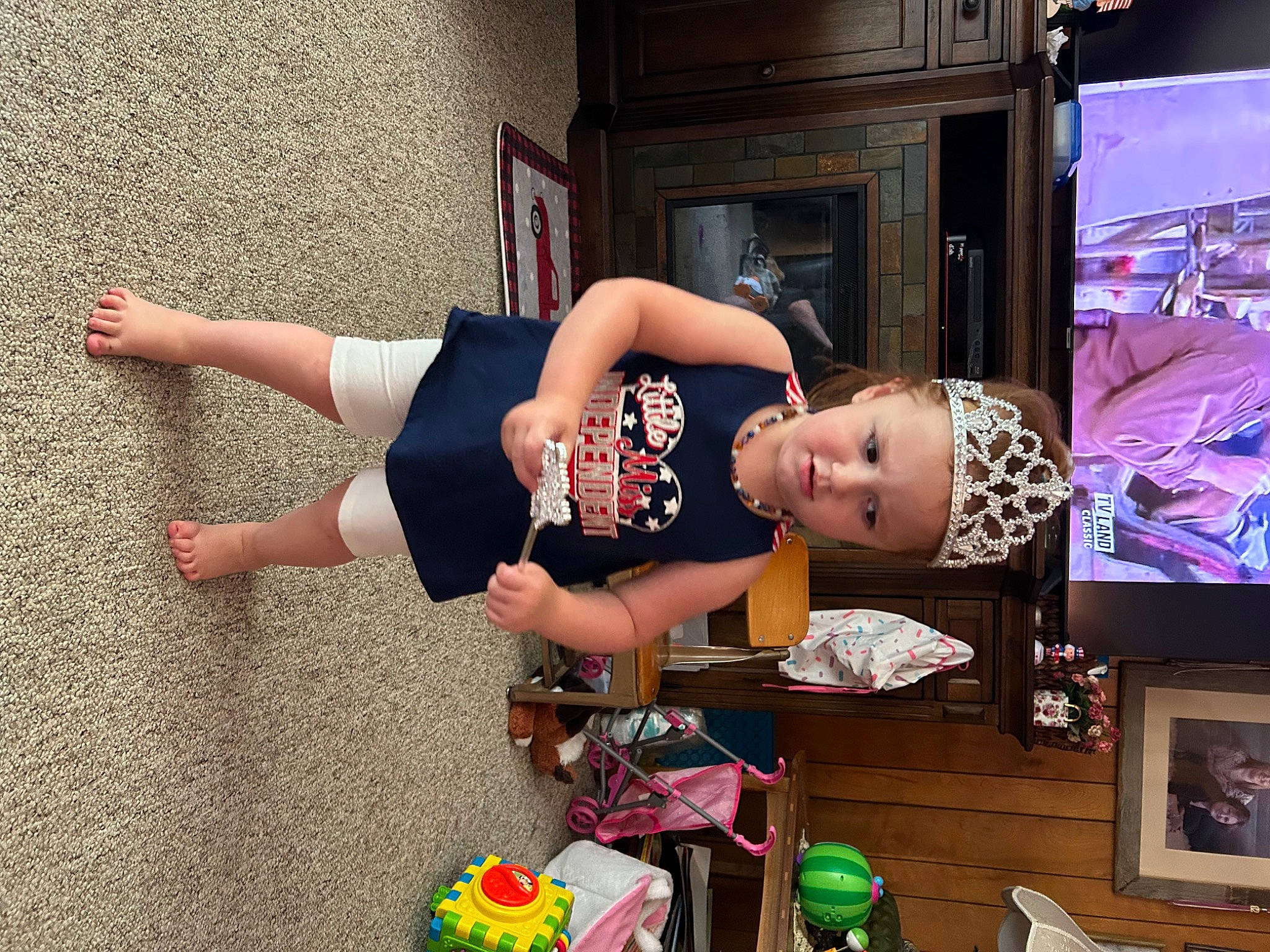 Kaizlee is registered to the contest to win money with this photo: art, building, display_device, eyewear, fashion_design, flooring, fun, headwear, human_leg, luggage_and_bags, person, room, sandal, t_shirt, television_set, thigh, visual_arts, waist