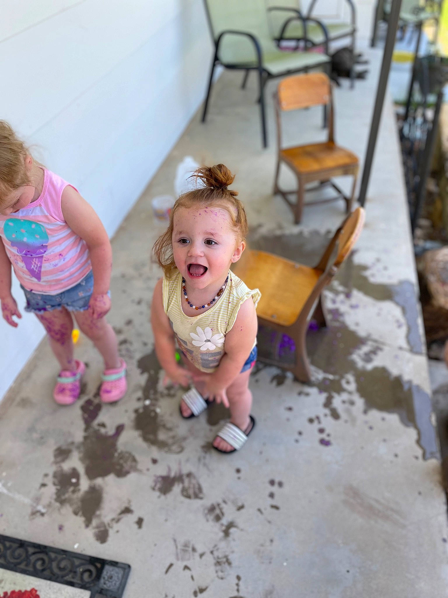 Kaizlee joined the competition — help win amazing prizes! baby, baby_toddler_clothing, chair, child, face, facial_expression, floor, flooring, fun, grass, happy, leisure, person, pink, recreation, sandal, sitting, smile, t_shirt, toddler