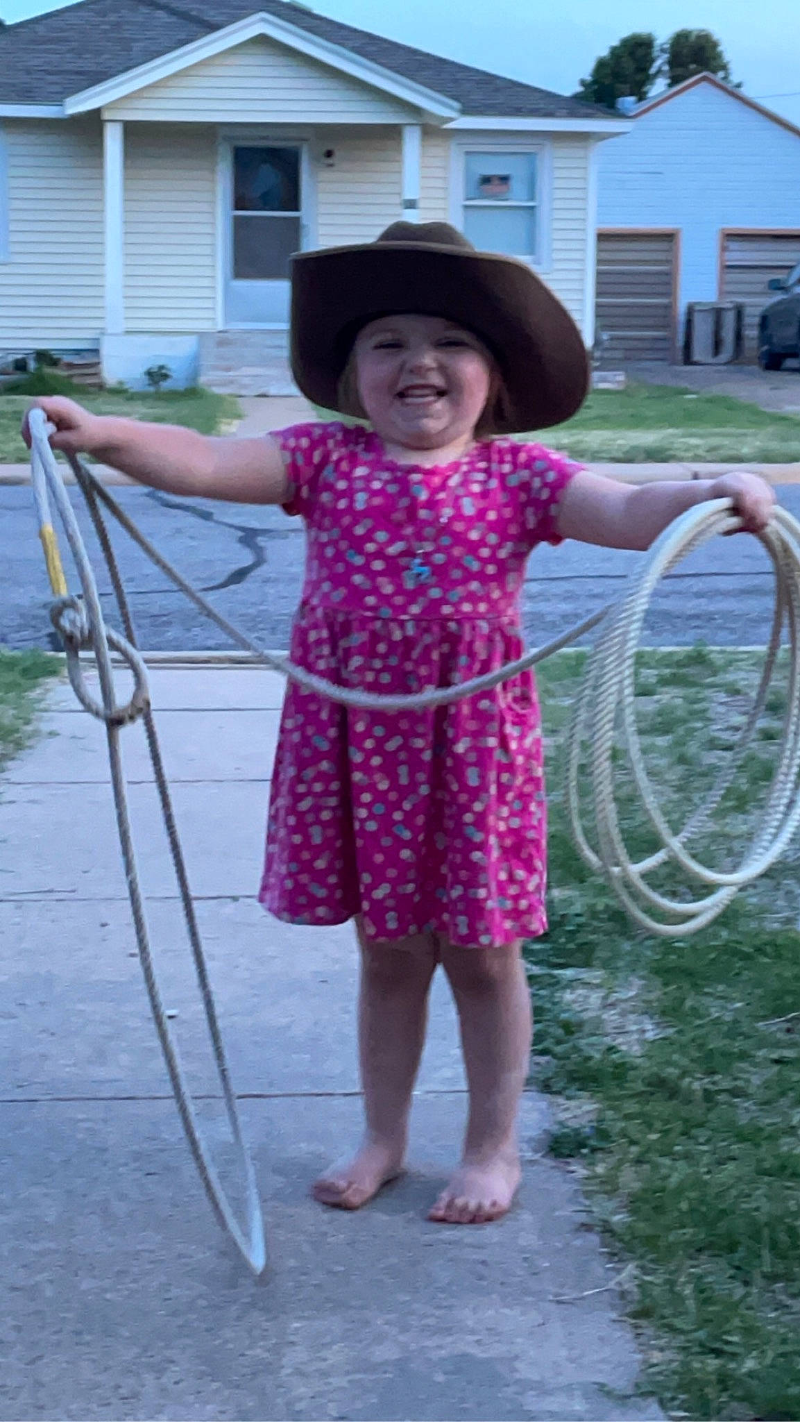 Kinzlee joined the competition — help win amazing prizes! automotive_tire, barefoot, beauty, child, electric_blue, fun, grass, hat, headwear, hose, joy, leisure, magenta, person, pink, plant, purple, recreation, smile, sun_hat