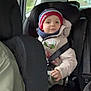 Dylan participe au concours pour gagner de l'argent avec cette photo : automobile, beanie, car_interior, car_seat, casual, child, face, headwear, jacket, passenger, person, road, safety, seat, seatbelt, travel, urban, window, winter_clothing, young_child