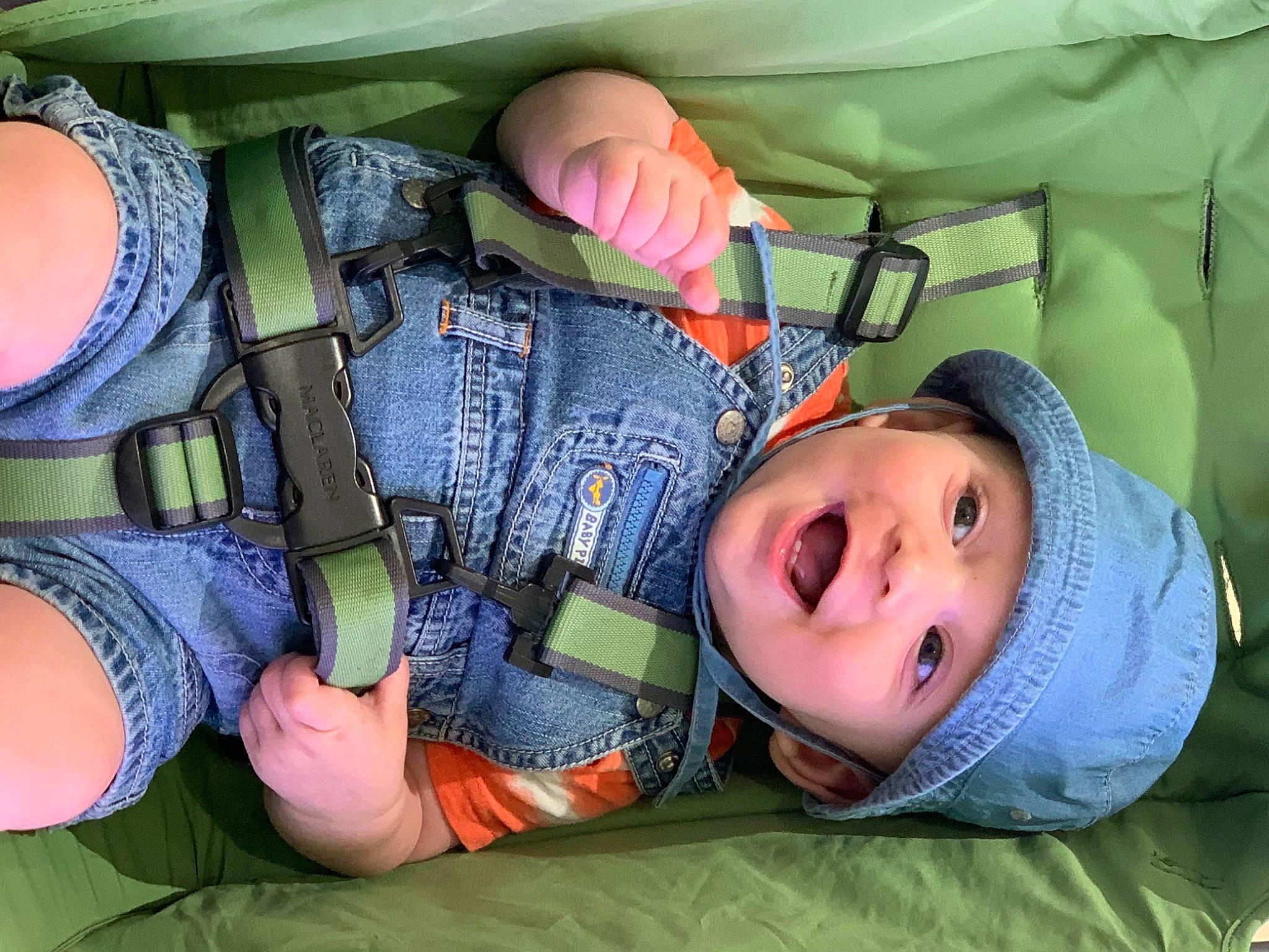 Ezra joined the competition — help win amazing prizes! baby, baby_toddler_clothing, child, comfort, cool, eye, eyewear, facial_expression, fun, grass, green, headgear, headwear, human_body, mouth, person, product, skin, smile, thigh