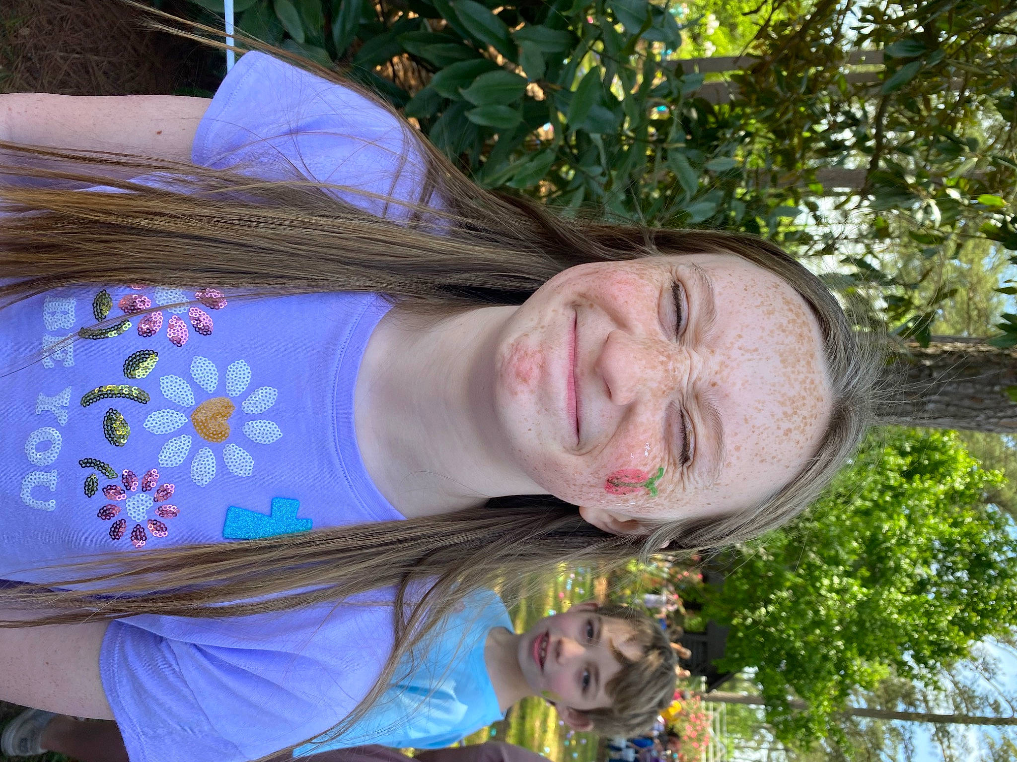 Riley is registered to the contest to win money with this photo: beauty, flesh, fun, grass, happy, joy, leisure, people_in_nature, person, plant, smile, throat, tree