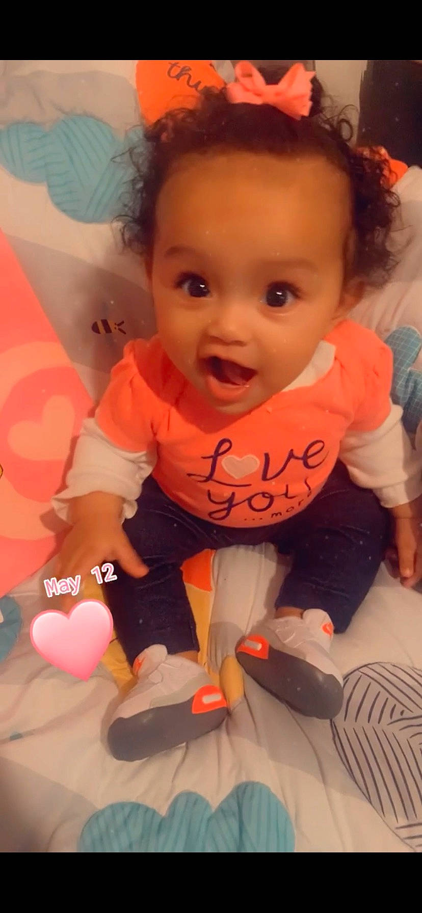 Aaniyah joined the competition — help win amazing prizes! arm, baby_toddler_clothing, cheek, facial_expression, finger, hairstyle, hand, happy, head, human, human_body, mouth, nose, orange, organ, person, product, skin, smile, surprise