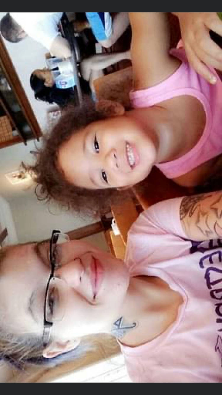 Arianna is registered to the contest to win money with this photo: black_hair, chest, chin, dress, eyebrow, eyelash, gesture, happy, human_leg, jaw, joy, lip, long_hair, mouth, muscle, neck, nose, person, shoulder, skin