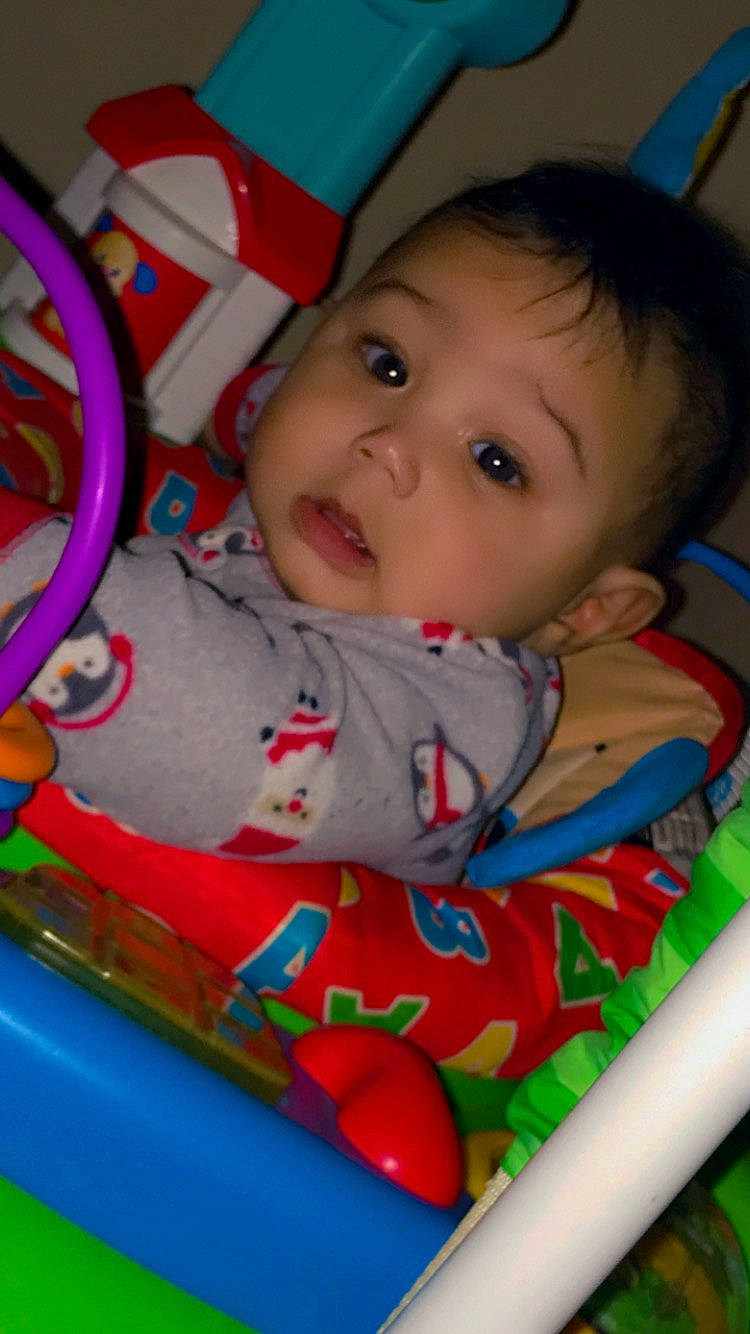 Jaiden joined the competition — help win amazing prizes! baby, baby_products, baby_toddler_clothing, bib, cheek, child, eye, face, fun, happy, head, iris, lip, mouth, nose, person, product, skin, smile, textile