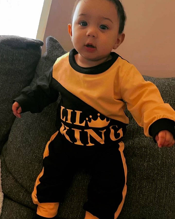 Jaiden joined the competition — help win amazing prizes! active_pants, arm, baby, baby_toddler_clothing, cheek, eye, face, finger, flooring, gesture, happy, head, jersey, long_sleeved_t_shirt, neck, person, personal_protective_equipment, sleeve, sportswear, t_shirt