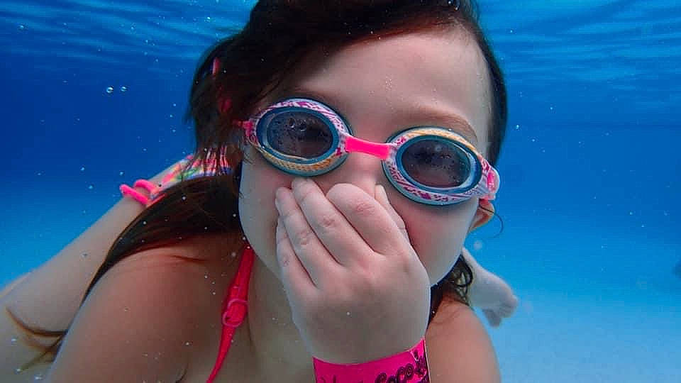 Camille joined the competition — help win amazing prizes! aqua, azure, black_hair, cool, eyelash, eyewear, goggles, happy, headgear, leisure, lip, mouth, person, personal_protective_equipment, pink, recreation, summer, swimwear, underwater, vision_care