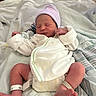 Serenity is registered to the contest to win money with this photo: newborn, baby, infant, sleeping, hospital, blanket, hat, diaper, legs, feet, wrapping, clothing, person, bed, rest, cute, peaceful, soft, indoors, patient