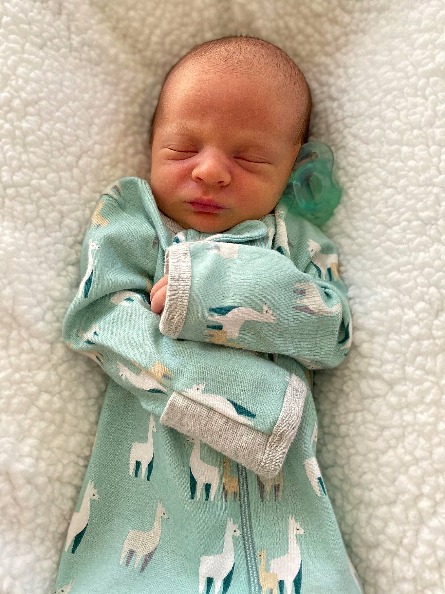 Justin is registered to the contest to win money with this photo: baby, baby_products, baby_sleeping, baby_toddler_clothing, bedding, cheek, child, comfort, eye, fashion_accessory, hand, infant_bed, linens, pattern, person, product, sitting, skin, sleeve, textile