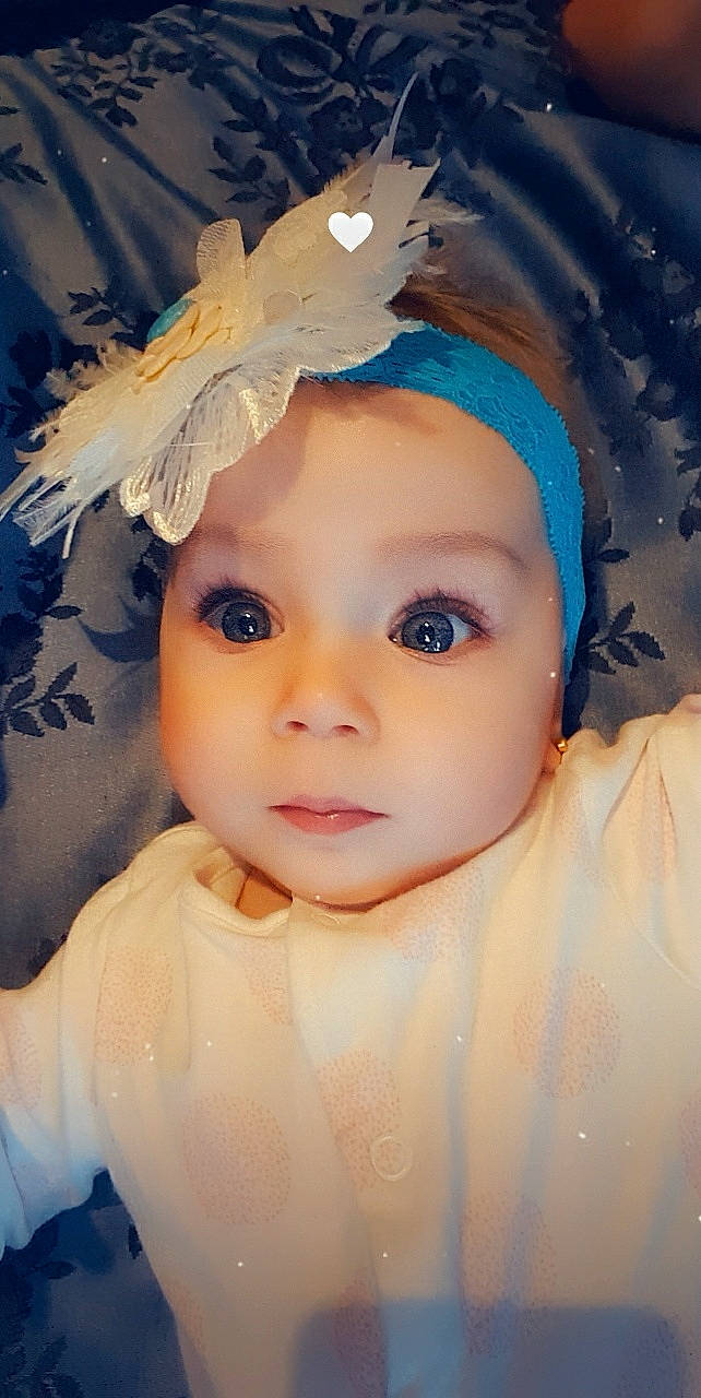 Rebecca joined the competition — help win amazing prizes! baby, cheek, child, doll, eye, eyebrow, face, forehead, hair_accessory, head, headgear, headwear, iris, lip, person, portrait, skin, toddler