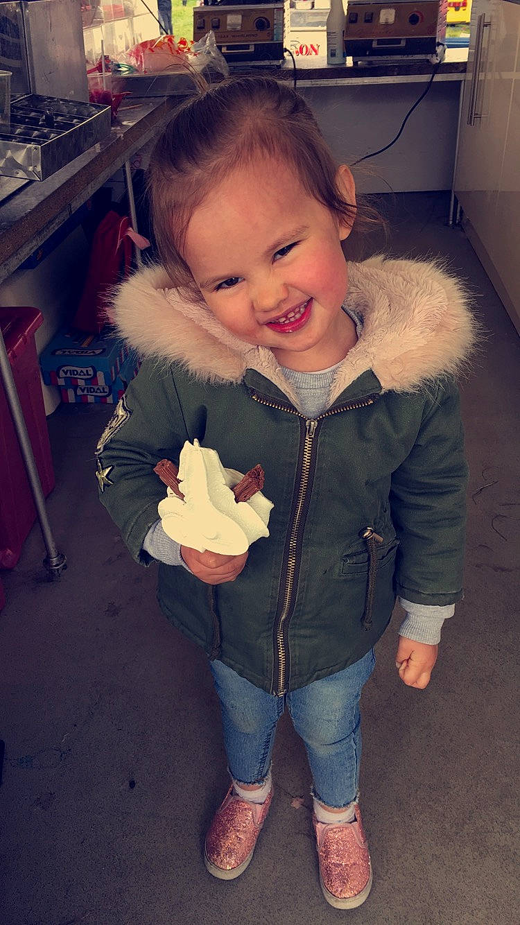 Leah-mae is registered to the contest to win money with this photo: cheek, child, cool, denim, fur, head, jacket, jeans, joy, leg, nose, outerwear, person, skin, sleeve, snapshot, standing, textile, toddler