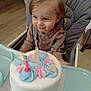 Bella participe au concours pour gagner de l'argent avec cette photo : toddler, child, birthday_cake, cake, candle, high_chair, smile, indoor, celebration, frosting, pastel_colors, seatbelt, baby_clothing, table, happy, face, person, hair, food, party
